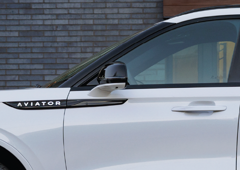 The driver’s door of a white 2025 Lincoln Aviator® SUV is showcased. | Joe Rizza Lincoln of Orland Park in Orland Park IL