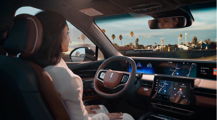 A person is shown driving hands-free on the highway with available Lincoln BlueCruise technology. | Joe Rizza Lincoln of Orland Park in Orland Park IL