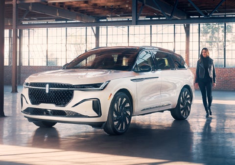 A person approaches a 2025 Lincoln Nautilus® SUV. | Joe Rizza Lincoln of Orland Park in Orland Park IL