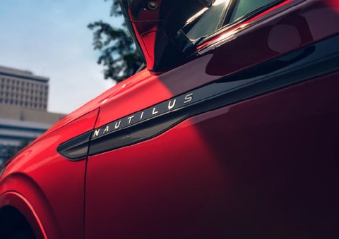 A side badge on the passenger door reads Nautilus. | Joe Rizza Lincoln of Orland Park in Orland Park IL