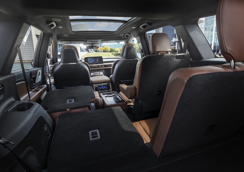One side of the PowerFold® third-row seat and a second-row seat are folded forward in the 2026 Lincoln Aviator® SUV. | Joe Rizza Lincoln of Orland Park in Orland Park IL