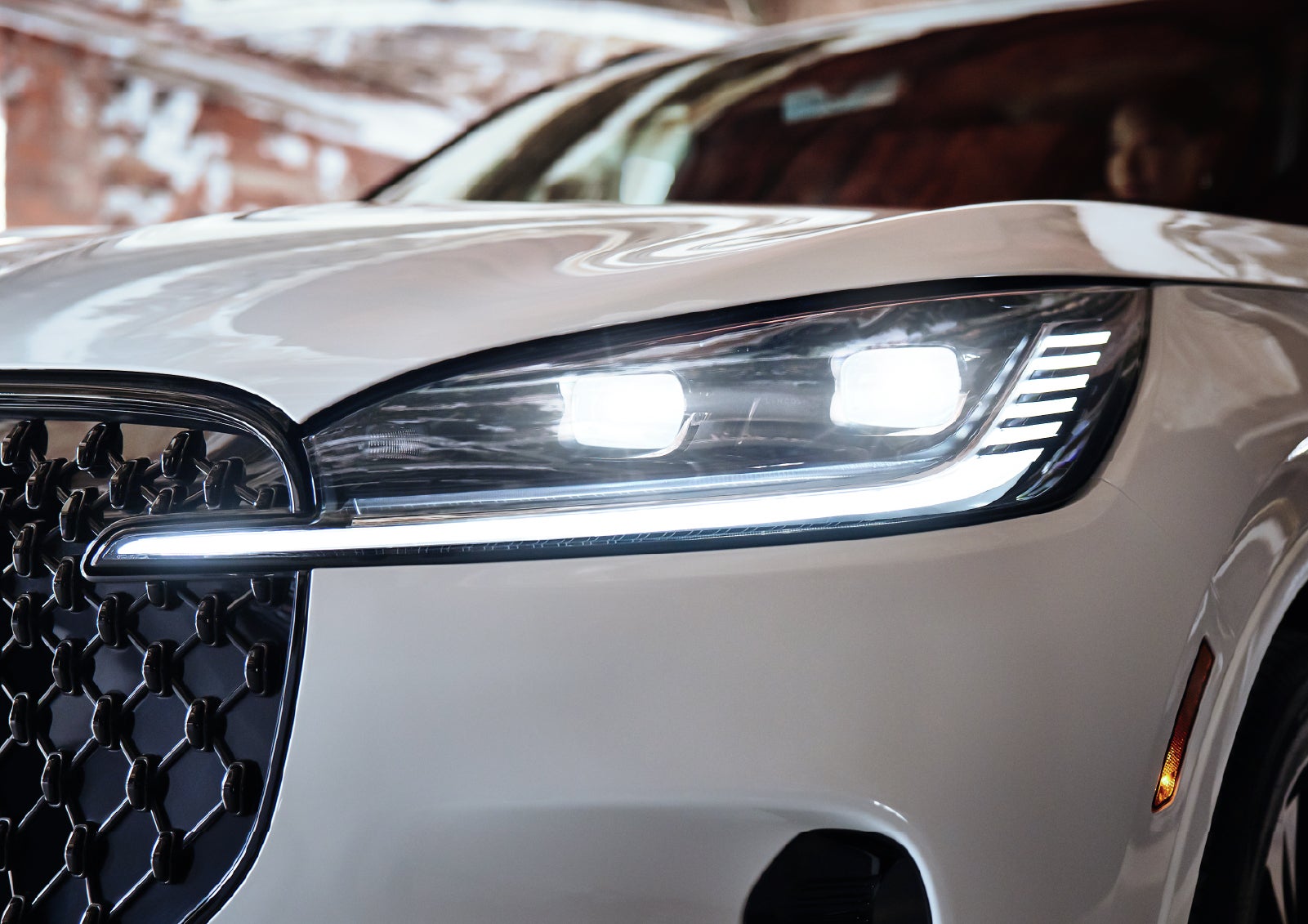 A close-up of a headlamp on the 2027 Lincoln Aviator® SUV is shown. | Joe Rizza Lincoln of Orland Park in Orland Park IL