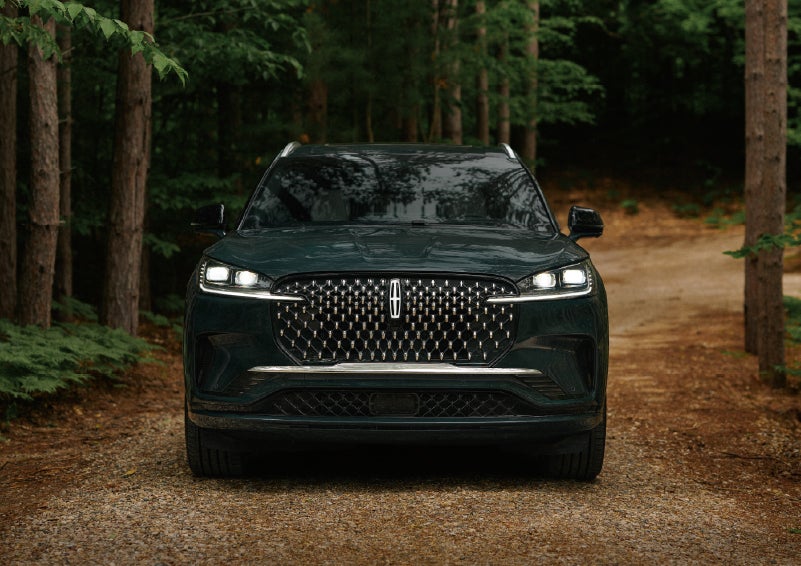 The front grille of a 2027 Lincoln Aviator® Black Label™ SUV is shown. | Joe Rizza Lincoln of Orland Park in Orland Park IL